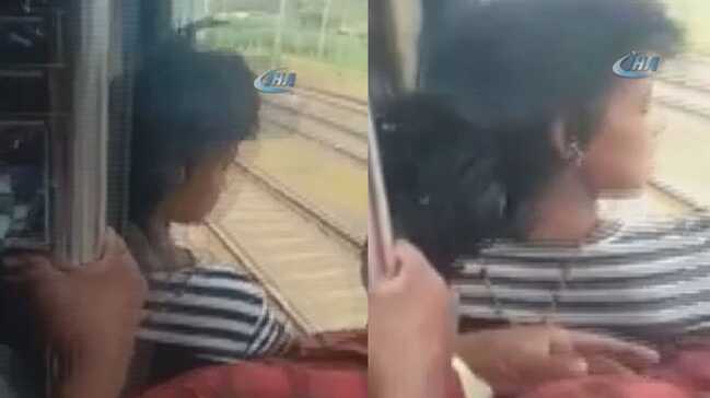 Hindistan’da trenden sarkan kızı yolcular son anda parçalanmaktan kurtardı